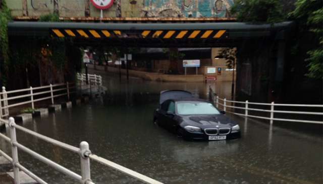 Britain must urgently prepare for flooding, heatwaves and food shortages